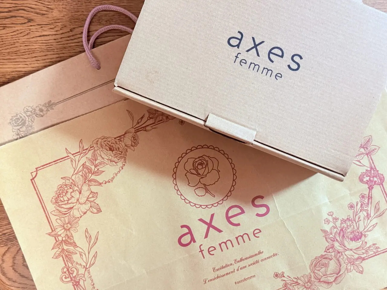 2026年1月25日に閉店するイオンモール高知の「axes femme（アクシーズ ファム）」のショッパー