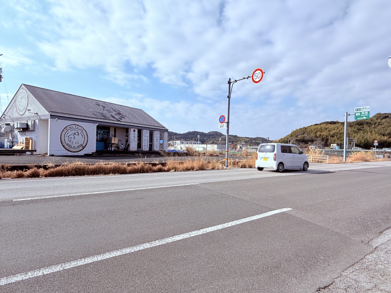 「らーめん チョンマゲ」の看板がついた建物